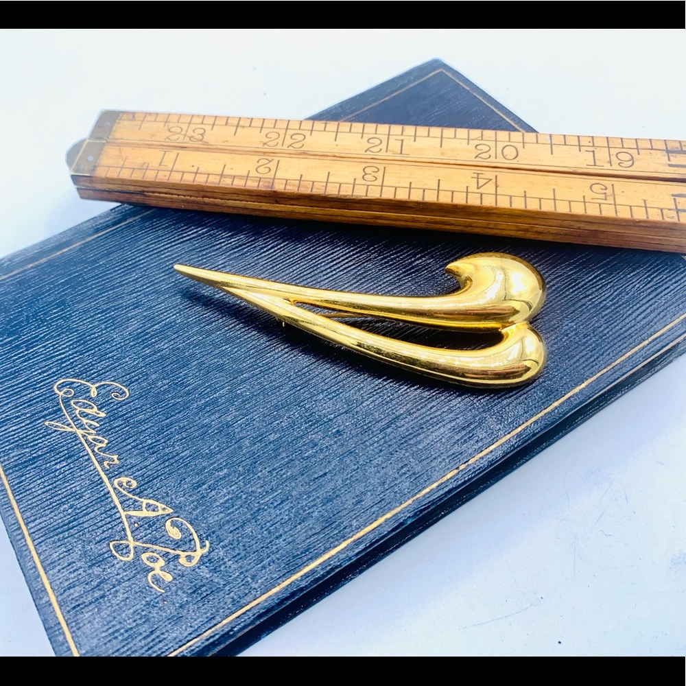 Vintage MONET gold brooch pin swoop